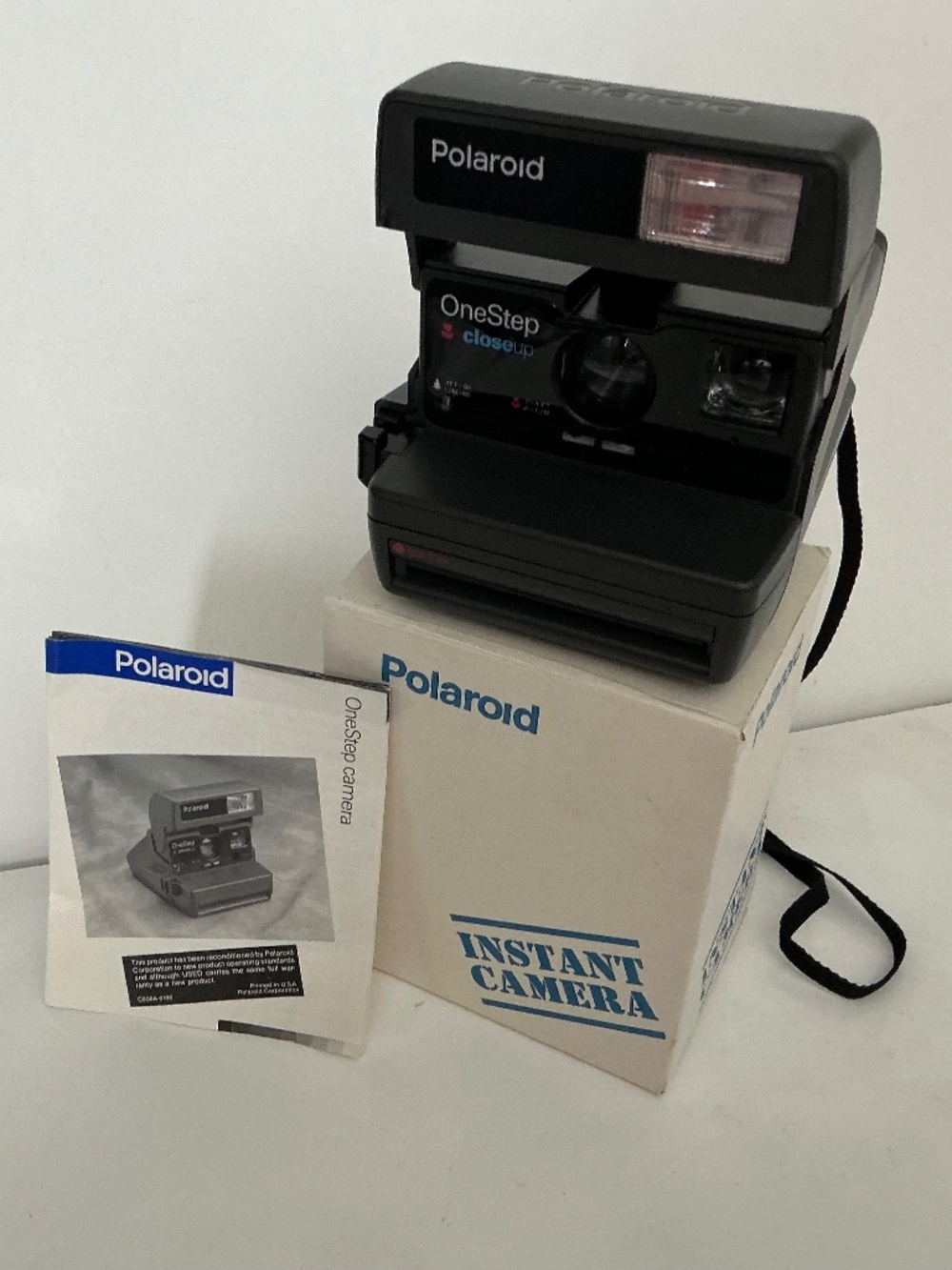 Polaroid Onestep 600 camera with box and directions